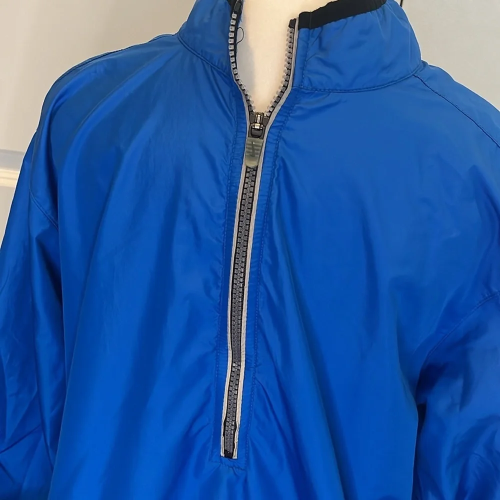 Nike youth L royal blue grey 1/2 zip windbreaker. Loose fit. Great condition
